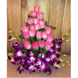 Roses and orchid arrangement